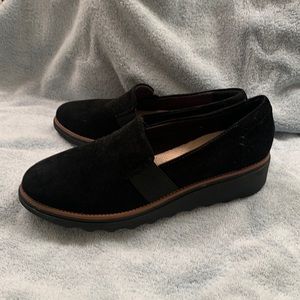 Clark’s black suede loafer